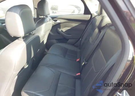 2015 Ford Focus Titanium from USA, damaged, VIN 1FADP3J25FL372557